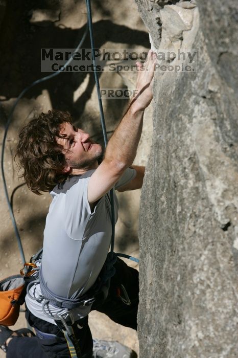 Andrew Dreher attempting the dyno while leading Lick the Window (5.10c), shot from the top of Ack! (5.11b, but using the crack for the start instead) that I top roped up with my camera on my back.  It was another long day of rock climbing at Seismic Wall on Austin's Barton Creek Greenbelt, Sunday, April 5, 2009.

Filename: SRM_20090405_13155910.jpg
Aperture: f/10.0
Shutter Speed: 1/500
Body: Canon EOS-1D Mark II
Lens: Canon EF 80-200mm f/2.8 L