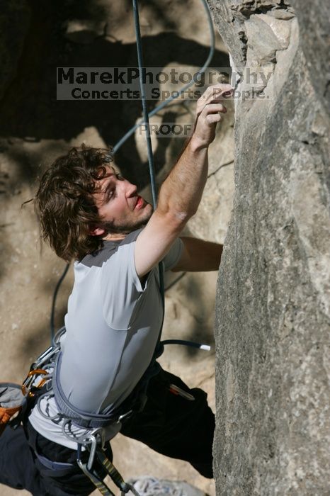 Andrew Dreher attempting the dyno while leading Lick the Window (5.10c), shot from the top of Ack! (5.11b, but using the crack for the start instead) that I top roped up with my camera on my back. It was another long day of rock climbing at Seismic Wall on Austin's Barton Creek Greenbelt, Sunday, April 5, 2009.
Filename: SRM_20090405_13155911.jpg
Aperture: f/10.0
Shutter Speed: 1/500
Body: Canon EOS-1D Mark II
Lens: Canon EF 80-200mm f/2.8 L