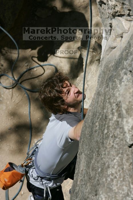 Andrew Dreher attempting the dyno while leading Lick the Window (5.10c), shot from the top of Ack! (5.11b, but using the crack for the start instead) that I top roped up with my camera on my back.  It was another long day of rock climbing at Seismic Wall on Austin's Barton Creek Greenbelt, Sunday, April 5, 2009.

Filename: SRM_20090405_13162915.jpg
Aperture: f/10.0
Shutter Speed: 1/500
Body: Canon EOS-1D Mark II
Lens: Canon EF 80-200mm f/2.8 L
