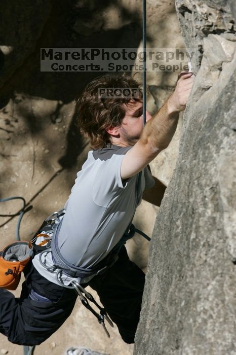 Andrew Dreher attempting the dyno while leading Lick the Window (5.10c), shot from the top of Ack! (5.11b, but using the crack for the start instead) that I top roped up with my camera on my back.  It was another long day of rock climbing at Seismic Wall on Austin's Barton Creek Greenbelt, Sunday, April 5, 2009.

Filename: SRM_20090405_13170825.jpg
Aperture: f/10.0
Shutter Speed: 1/500
Body: Canon EOS-1D Mark II
Lens: Canon EF 80-200mm f/2.8 L