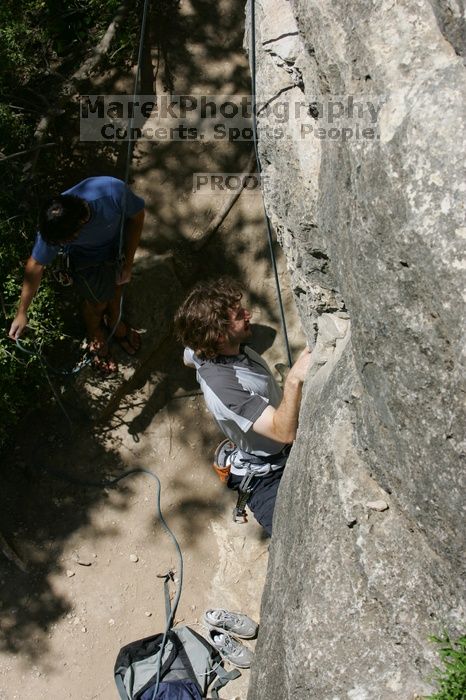 Andrew Dreher attempting the dyno while leading Lick the Window (5.10c) with Javier Morales belaying, shot from the top of Ack! (5.11b, but using the crack for the start instead) that I top roped up with my camera on my back. It was another long day of rock climbing at Seismic Wall on Austin's Barton Creek Greenbelt, Sunday, April 5, 2009.
Filename: SRM_20090405_13171534.jpg
Aperture: f/9.0
Shutter Speed: 1/500
Body: Canon EOS-1D Mark II
Lens: Canon EF 80-200mm f/2.8 L