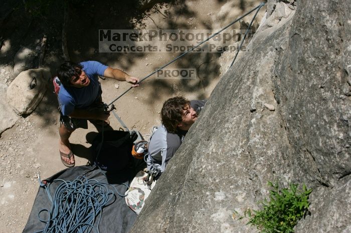 Andrew Dreher attempting the dyno while leading Lick the Window (5.10c) with Javier Morales belaying, shot from the top of Ack! (5.11b, but using the crack for the start instead) that I top roped up with my camera on my back. It was another long day of rock climbing at Seismic Wall on Austin's Barton Creek Greenbelt, Sunday, April 5, 2009.
Filename: SRM_20090405_13212036.jpg
Aperture: f/11.0
Shutter Speed: 1/500
Body: Canon EOS-1D Mark II
Lens: Canon EF 80-200mm f/2.8 L