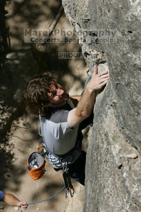 Andrew Dreher leading Lick the Window (5.10c), shot from the top of Ack! (5.11b, but using the crack for the start instead) that I top roped up with my camera on my back. It was another long day of rock climbing at Seismic Wall on Austin's Barton Creek Greenbelt, Sunday, April 5, 2009.
Filename: SRM_20090405_13213653.jpg
Aperture: f/11.0
Shutter Speed: 1/500
Body: Canon EOS-1D Mark II
Lens: Canon EF 80-200mm f/2.8 L