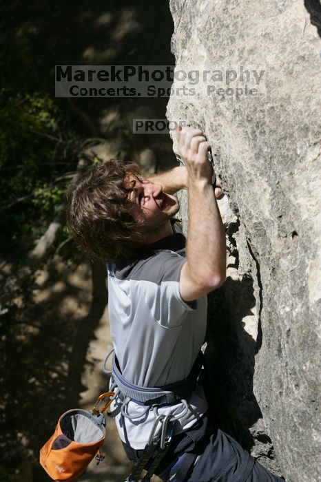 Andrew Dreher leading Lick the Window (5.10c), shot from the top of Ack! (5.11b, but using the crack for the start instead) that I top roped up with my camera on my back.  It was another long day of rock climbing at Seismic Wall on Austin's Barton Creek Greenbelt, Sunday, April 5, 2009.

Filename: SRM_20090405_13224180.jpg
Aperture: f/9.0
Shutter Speed: 1/500
Body: Canon EOS-1D Mark II
Lens: Canon EF 80-200mm f/2.8 L