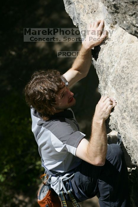 Andrew Dreher leading Lick the Window (5.10c), shot from the top of Ack! (5.11b, but using the crack for the start instead) that I top roped up with my camera on my back.  It was another long day of rock climbing at Seismic Wall on Austin's Barton Creek Greenbelt, Sunday, April 5, 2009.

Filename: SRM_20090405_13225593.jpg
Aperture: f/5.6
Shutter Speed: 1/500
Body: Canon EOS-1D Mark II
Lens: Canon EF 80-200mm f/2.8 L