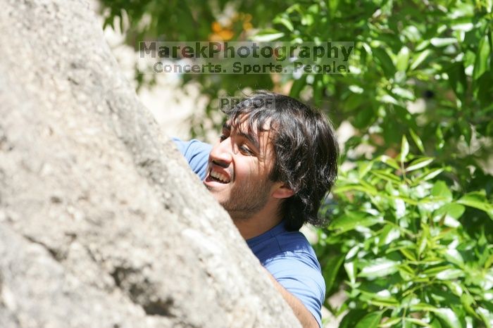 Javier Morales leading Nose Print on the Windshield (5.11c), shot from the top of Ack! (5.11b, but using the crack for the start instead) that I top roped up with my camera on my back.  It was another long day of rock climbing at Seismic Wall on Austin's Barton Creek Greenbelt, Sunday, April 5, 2009.

Filename: SRM_20090405_13320054.jpg
Aperture: f/6.3
Shutter Speed: 1/500
Body: Canon EOS-1D Mark II
Lens: Canon EF 80-200mm f/2.8 L