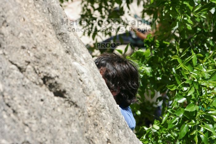 Javier Morales leading Nose Print on the Windshield (5.11c), shot from the top of Ack! (5.11b, but using the crack for the start instead) that I top roped up with my camera on my back.  It was another long day of rock climbing at Seismic Wall on Austin's Barton Creek Greenbelt, Sunday, April 5, 2009.

Filename: SRM_20090405_13333970.jpg
Aperture: f/9.0
Shutter Speed: 1/500
Body: Canon EOS-1D Mark II
Lens: Canon EF 80-200mm f/2.8 L