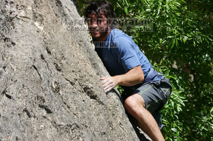 Javier Morales leading Nose Print on the Windshield (5.11c), shot from the top of Ack! (5.11b, but using the crack for the start instead) that I top roped up with my camera on my back. It was another long day of rock climbing at Seismic Wall on Austin's Barton Creek Greenbelt, Sunday, April 5, 2009.
Filename: SRM_20090405_13340487.jpg
Aperture: f/10.0
Shutter Speed: 1/500
Body: Canon EOS-1D Mark II
Lens: Canon EF 80-200mm f/2.8 L