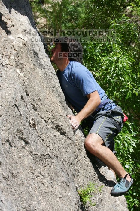 Javier Morales leading Nose Print on the Windshield (5.11c), shot from the top of Ack! (5.11b, but using the crack for the start instead) that I top roped up with my camera on my back. It was another long day of rock climbing at Seismic Wall on Austin's Barton Creek Greenbelt, Sunday, April 5, 2009.
Filename: SRM_20090405_13341091.jpg
Aperture: f/9.0
Shutter Speed: 1/500
Body: Canon EOS-1D Mark II
Lens: Canon EF 80-200mm f/2.8 L