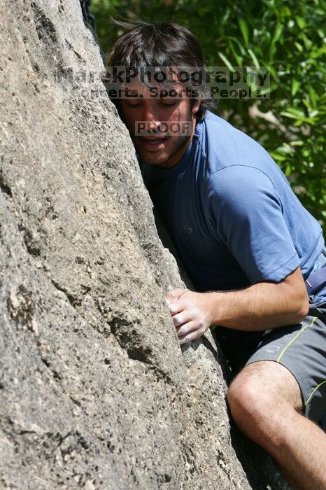Javier Morales leading Nose Print on the Windshield (5.11c), shot from the top of Ack! (5.11b, but using the crack for the start instead) that I top roped up with my camera on my back. It was another long day of rock climbing at Seismic Wall on Austin's Barton Creek Greenbelt, Sunday, April 5, 2009.
Filename: SRM_20090405_13341593.jpg
Aperture: f/9.0
Shutter Speed: 1/500
Body: Canon EOS-1D Mark II
Lens: Canon EF 80-200mm f/2.8 L
