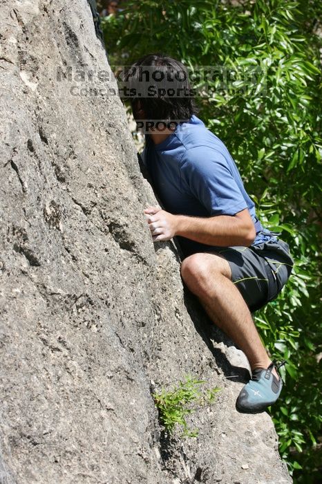 Javier Morales leading Nose Print on the Windshield (5.11c), shot from the top of Ack! (5.11b, but using the crack for the start instead) that I top roped up with my camera on my back.  It was another long day of rock climbing at Seismic Wall on Austin's Barton Creek Greenbelt, Sunday, April 5, 2009.

Filename: SRM_20090405_13342296.jpg
Aperture: f/9.0
Shutter Speed: 1/500
Body: Canon EOS-1D Mark II
Lens: Canon EF 80-200mm f/2.8 L