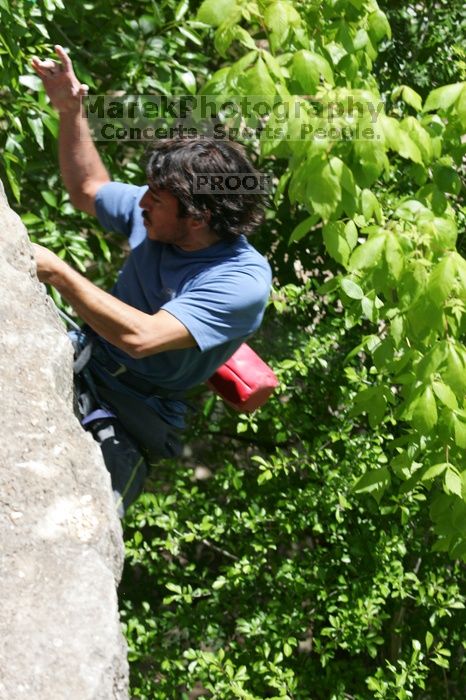 Javier Morales leading Nose Print on the Windshield (5.11c), shot from the top of Ack! (5.11b, but using the crack for the start instead) that I top roped up with my camera on my back. It was another long day of rock climbing at Seismic Wall on Austin's Barton Creek Greenbelt, Sunday, April 5, 2009.
Filename: SRM_20090405_13342902.jpg
Aperture: f/7.1
Shutter Speed: 1/500
Body: Canon EOS-1D Mark II
Lens: Canon EF 80-200mm f/2.8 L