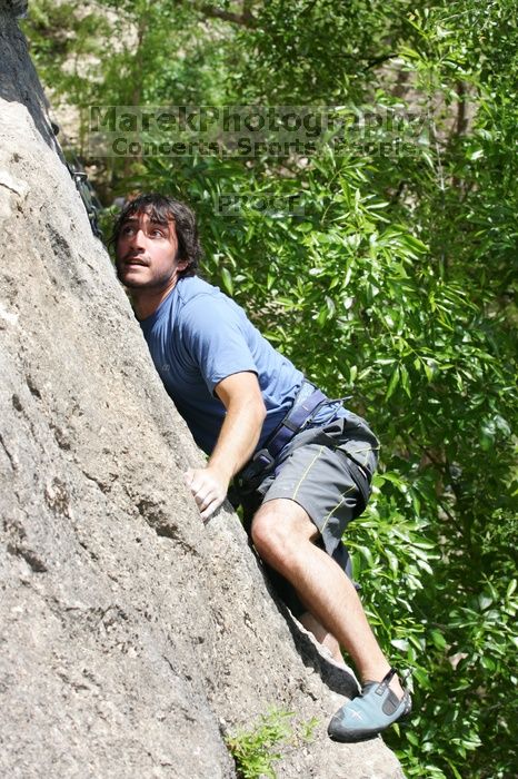 Javier Morales leading Nose Print on the Windshield (5.11c), shot from the top of Ack! (5.11b, but using the crack for the start instead) that I top roped up with my camera on my back. It was another long day of rock climbing at Seismic Wall on Austin's Barton Creek Greenbelt, Sunday, April 5, 2009.
Filename: SRM_20090405_13371514.jpg
Aperture: f/7.1
Shutter Speed: 1/500
Body: Canon EOS-1D Mark II
Lens: Canon EF 80-200mm f/2.8 L
