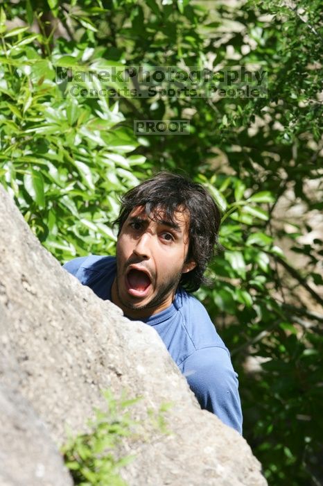 Javier Morales leading Nose Print on the Windshield (5.11c), shot from the top of Ack! (5.11b, but using the crack for the start instead) that I top roped up with my camera on my back.  It was another long day of rock climbing at Seismic Wall on Austin's Barton Creek Greenbelt, Sunday, April 5, 2009.

Filename: SRM_20090405_14554081.jpg
Aperture: f/8.0
Shutter Speed: 1/500
Body: Canon EOS-1D Mark II
Lens: Canon EF 80-200mm f/2.8 L