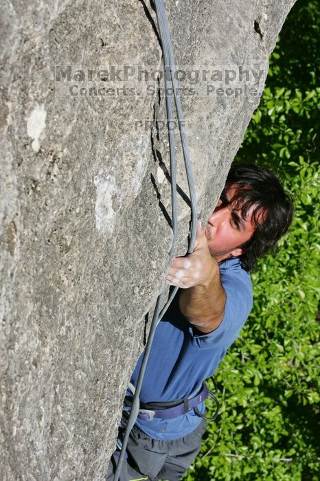 Javier Morales top rope climbing She's No Dog, She's My Wife (5.11b), shot from the top of Ack! (5.11b, but using the crack for the start instead) that I top roped up with my camera on my back. It was another long day of rock climbing at Seismic Wall on Austin's Barton Creek Greenbelt, Sunday, April 5, 2009.
Filename: SRM_20090405_16172405.jpg
Aperture: f/13.0
Shutter Speed: 1/500
Body: Canon EOS-1D Mark II
Lens: Canon EF 80-200mm f/2.8 L