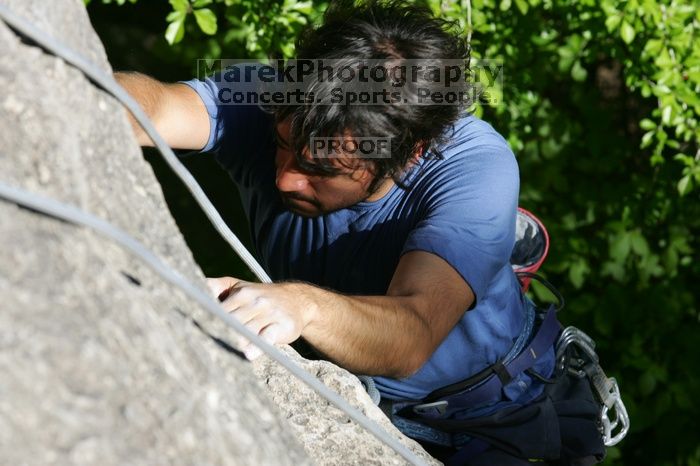 Javier Morales top rope climbing She's No Dog, She's My Wife (5.11b), shot from the top of Ack! (5.11b, but using the crack for the start instead) that I top roped up with my camera on my back. It was another long day of rock climbing at Seismic Wall on Austin's Barton Creek Greenbelt, Sunday, April 5, 2009.
Filename: SRM_20090405_16475941.jpg
Aperture: f/9.0
Shutter Speed: 1/400
Body: Canon EOS-1D Mark II
Lens: Canon EF 80-200mm f/2.8 L