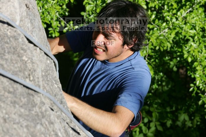 Javier Morales top rope climbing She's No Dog, She's My Wife (5.11b), shot from the top of Ack! (5.11b, but using the crack for the start instead) that I top roped up with my camera on my back.  It was another long day of rock climbing at Seismic Wall on Austin's Barton Creek Greenbelt, Sunday, April 5, 2009.

Filename: SRM_20090405_16480143.jpg
Aperture: f/9.0
Shutter Speed: 1/400
Body: Canon EOS-1D Mark II
Lens: Canon EF 80-200mm f/2.8 L