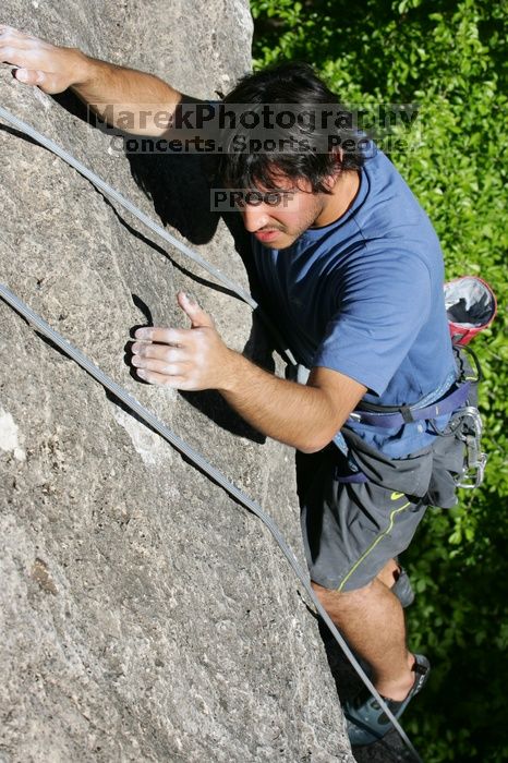 Javier Morales top rope climbing She's No Dog, She's My Wife (5.11b), shot from the top of Ack! (5.11b, but using the crack for the start instead) that I top roped up with my camera on my back. It was another long day of rock climbing at Seismic Wall on Austin's Barton Creek Greenbelt, Sunday, April 5, 2009.
Filename: SRM_20090405_16482754.jpg
Aperture: f/8.0
Shutter Speed: 1/500
Body: Canon EOS-1D Mark II
Lens: Canon EF 80-200mm f/2.8 L