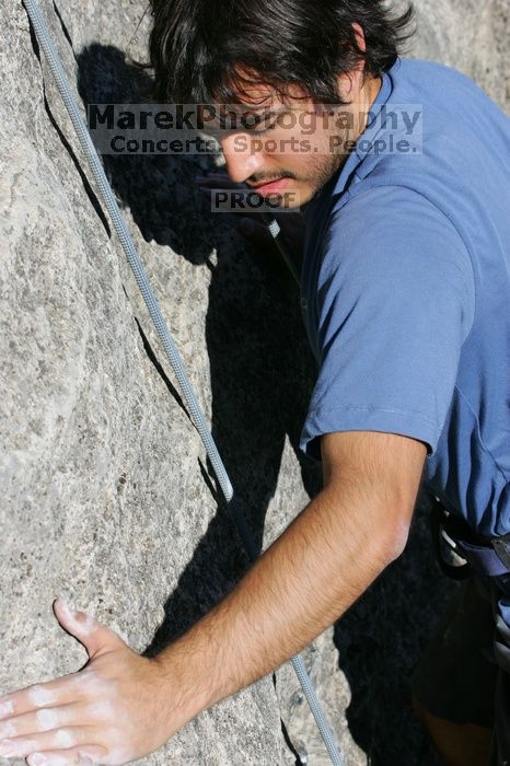 Javier Morales top rope climbing She's No Dog, She's My Wife (5.11b), shot from the top of Ack! (5.11b, but using the crack for the start instead) that I top roped up with my camera on my back. It was another long day of rock climbing at Seismic Wall on Austin's Barton Creek Greenbelt, Sunday, April 5, 2009.
Filename: SRM_20090405_16490069.jpg
Aperture: f/9.0
Shutter Speed: 1/500
Body: Canon EOS-1D Mark II
Lens: Canon EF 80-200mm f/2.8 L