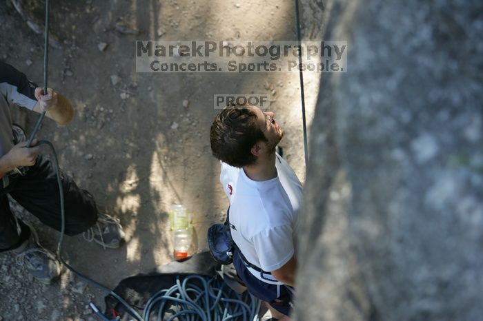 Me top roping Lick the Window (5.10c), shot by Javier Morales from the top of Ack! (5.11b, but using the crack for the start instead) that I top roped up with my camera on my back.  It was another long day of rock climbing at Seismic Wall on Austin's Barton Creek Greenbelt, Sunday, April 5, 2009.

Filename: SRM_20090405_17173692.jpg
Aperture: f/3.2
Shutter Speed: 1/400
Body: Canon EOS-1D Mark II
Lens: Canon EF 80-200mm f/2.8 L