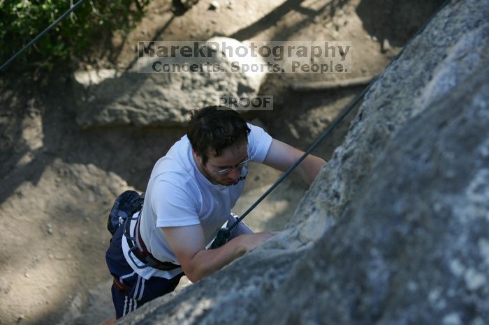 Me top roping Lick the Window (5.10c), shot by Javier Morales from the top of Ack! (5.11b, but using the crack for the start instead) that I top roped up with my camera on my back. It was another long day of rock climbing at Seismic Wall on Austin's Barton Creek Greenbelt, Sunday, April 5, 2009.
Filename: SRM_20090405_17182222.jpg
Aperture: f/3.5
Shutter Speed: 1/400
Body: Canon EOS-1D Mark II
Lens: Canon EF 80-200mm f/2.8 L