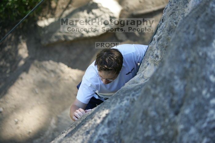 Me top roping Lick the Window (5.10c), shot by Javier Morales from the top of Ack! (5.11b, but using the crack for the start instead) that I top roped up with my camera on my back.  It was another long day of rock climbing at Seismic Wall on Austin's Barton Creek Greenbelt, Sunday, April 5, 2009.

Filename: SRM_20090405_17183530.jpg
Aperture: f/2.8
Shutter Speed: 1/400
Body: Canon EOS-1D Mark II
Lens: Canon EF 80-200mm f/2.8 L