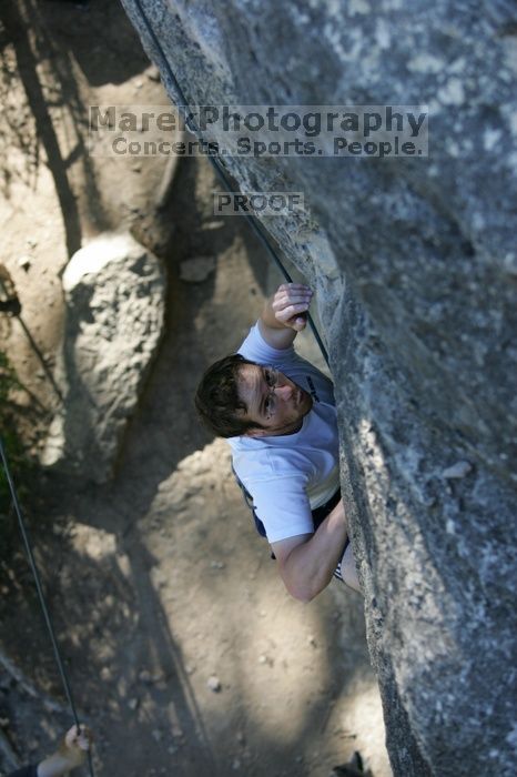 Me top roping Lick the Window (5.10c), shot by Javier Morales from the top of Ack! (5.11b, but using the crack for the start instead) that I top roped up with my camera on my back.  It was another long day of rock climbing at Seismic Wall on Austin's Barton Creek Greenbelt, Sunday, April 5, 2009.

Filename: SRM_20090405_17185849.jpg
Aperture: f/3.5
Shutter Speed: 1/400
Body: Canon EOS-1D Mark II
Lens: Canon EF 80-200mm f/2.8 L