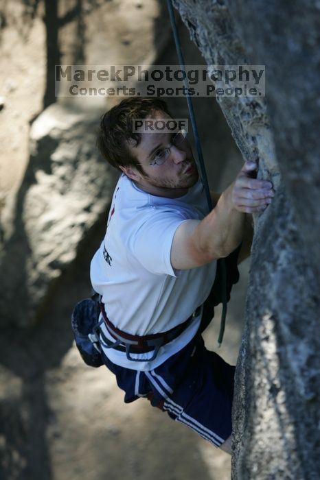 Me top roping Lick the Window (5.10c), shot by Javier Morales from the top of Ack! (5.11b, but using the crack for the start instead) that I top roped up with my camera on my back. It was another long day of rock climbing at Seismic Wall on Austin's Barton Creek Greenbelt, Sunday, April 5, 2009.
Filename: SRM_20090405_17202379.jpg
Aperture: f/4.0
Shutter Speed: 1/400
Body: Canon EOS-1D Mark II
Lens: Canon EF 80-200mm f/2.8 L