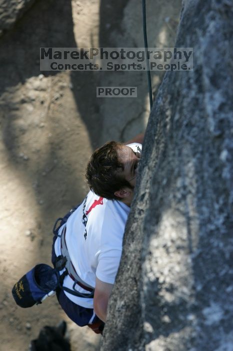 Me top roping Lick the Window (5.10c), shot by Javier Morales from the top of Ack! (5.11b, but using the crack for the start instead) that I top roped up with my camera on my back.  It was another long day of rock climbing at Seismic Wall on Austin's Barton Creek Greenbelt, Sunday, April 5, 2009.

Filename: SRM_20090405_17241119.jpg
Aperture: f/5.0
Shutter Speed: 1/320
Body: Canon EOS-1D Mark II
Lens: Canon EF 80-200mm f/2.8 L