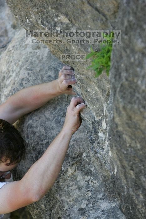 Me top roping Lick the Window (5.10c), shot by Javier Morales from the top of Ack! (5.11b, but using the crack for the start instead) that I top roped up with my camera on my back.  It was another long day of rock climbing at Seismic Wall on Austin's Barton Creek Greenbelt, Sunday, April 5, 2009.

Filename: SRM_20090405_17284133.jpg
Aperture: f/4.0
Shutter Speed: 1/320
Body: Canon EOS-1D Mark II
Lens: Canon EF 80-200mm f/2.8 L