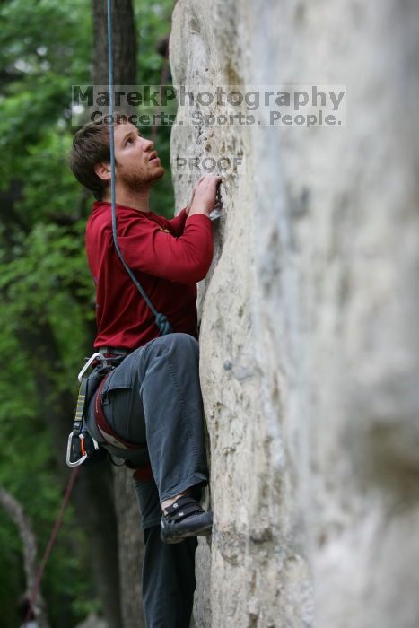 Me top rope climbing Angel of Poets (5.10a), taken by Andrew Dreher.  It was another long day of rock climbing at Seismic Wall on Austin's Barton Creek Greenbelt, Saturday, April 11, 2009.

Filename: SRM_20090411_13052026.JPG
Aperture: f/3.2
Shutter Speed: 1/200
Body: Canon EOS-1D Mark II
Lens: Canon EF 80-200mm f/2.8 L