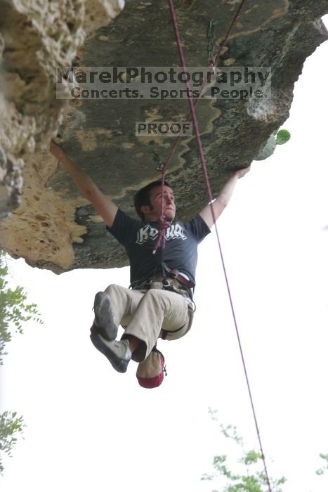 Someone trying to climb Cuttin Cards for a Poke (5.12+).  It was another long day of rock climbing at Seismic Wall on Austin's Barton Creek Greenbelt, Saturday, April 11, 2009.

Filename: SRM_20090411_13194537.JPG
Aperture: f/8.0
Shutter Speed: 1/60
Body: Canon EOS-1D Mark II
Lens: Canon EF 80-200mm f/2.8 L