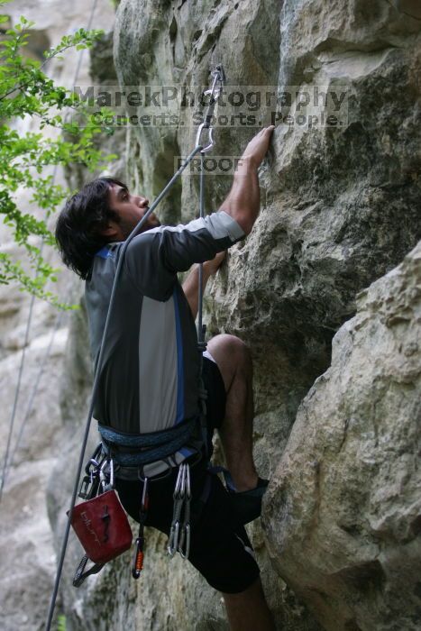 Javier Morales lead climbing Nose Print on the Windshield (5.11c).  It was another long day of rock climbing at Seismic Wall on Austin's Barton Creek Greenbelt, Saturday, April 11, 2009.

Filename: SRM_20090411_13220742.JPG
Aperture: f/2.8
Shutter Speed: 1/400
Body: Canon EOS-1D Mark II
Lens: Canon EF 80-200mm f/2.8 L