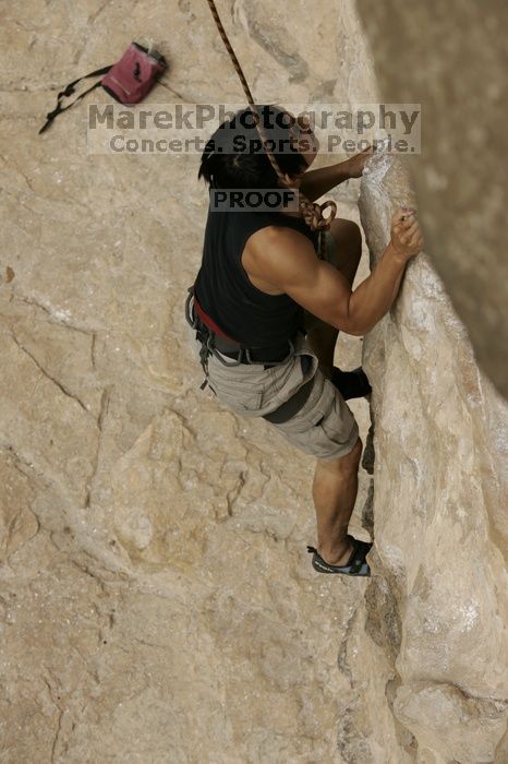 Long Ta, winner of the speed competition with a time of 15.33 seconds. CTM hosted a speed climbing event at Seismic Wall on Diving for Rocks to benefit the Austin Area Food Bank, Saturday, May 9, 2009.
Filename: SRM_20090509_11332042.jpg
Aperture: f/5.6
Shutter Speed: 1/1000
Body: Canon EOS-1D Mark II
Lens: Canon EF 80-200mm f/2.8 L