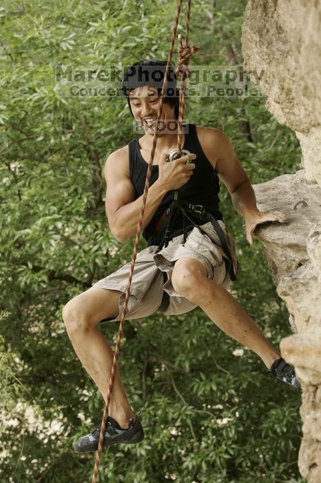 Long Ta, winner of the speed competition with a time of 15.33 seconds. CTM hosted a speed climbing event at Seismic Wall on Diving for Rocks to benefit the Austin Area Food Bank, Saturday, May 9, 2009.
Filename: SRM_20090509_11334068.jpg
Aperture: f/5.6
Shutter Speed: 1/250
Body: Canon EOS-1D Mark II
Lens: Canon EF 80-200mm f/2.8 L