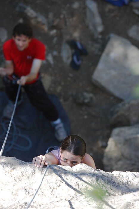 Beth Marek top rope climbing Roo Dog (5.8) with Andrew Dreher belaying, taken from the anchors of the route. It was Beth's third time outside, and another long day of rock climbing at Seismic Wall on Austin's Barton Creek Greenbelt, Monday, May 25, 2009.
Filename: SRM_20090525_09411789.JPG
Aperture: f/4.0
Shutter Speed: 1/500
Body: Canon EOS-1D Mark II
Lens: Canon EF 80-200mm f/2.8 L