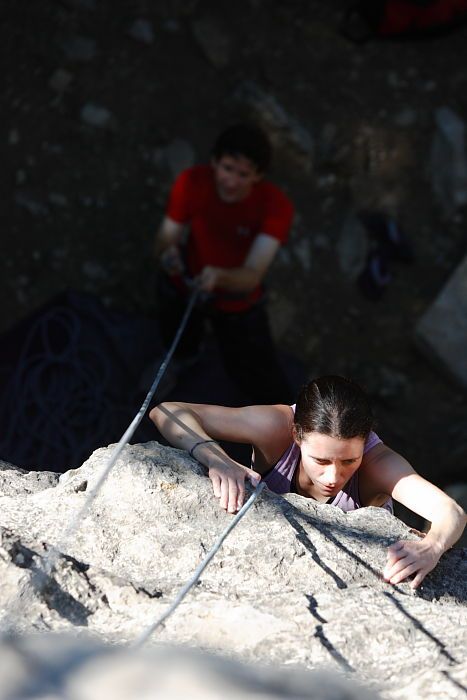 Beth Marek top rope climbing Roo Dog (5.8) with Andrew Dreher belaying, taken from the anchors of the route. It was Beth's third time outside, and another long day of rock climbing at Seismic Wall on Austin's Barton Creek Greenbelt, Monday, May 25, 2009.
Filename: SRM_20090525_09415598.JPG
Aperture: f/4.0
Shutter Speed: 1/800
Body: Canon EOS-1D Mark II
Lens: Canon EF 80-200mm f/2.8 L