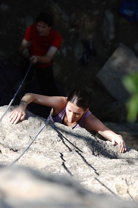 Beth Marek top rope climbing Roo Dog (5.8) with Andrew Dreher belaying, taken from the anchors of the route. It was Beth's third time outside, and another long day of rock climbing at Seismic Wall on Austin's Barton Creek Greenbelt, Monday, May 25, 2009.
Filename: SRM_20090525_09420199.JPG
Aperture: f/4.0
Shutter Speed: 1/1000
Body: Canon EOS-1D Mark II
Lens: Canon EF 80-200mm f/2.8 L