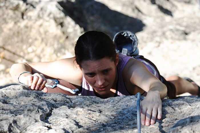 Beth Marek top rope climbing Roo Dog (5.8), taken from the anchors of the route. It was Beth's third time outside, and another long day of rock climbing at Seismic Wall on Austin's Barton Creek Greenbelt, Monday, May 25, 2009.
Filename: SRM_20090525_09494549.JPG
Aperture: f/5.0
Shutter Speed: 1/1250
Body: Canon EOS-1D Mark II
Lens: Canon EF 80-200mm f/2.8 L