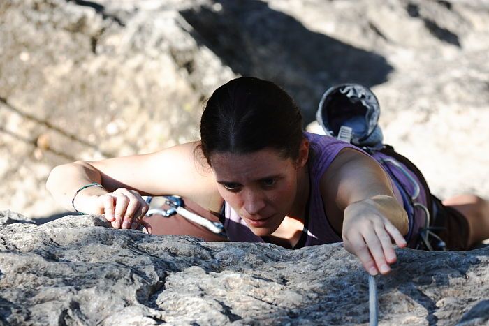 Beth Marek top rope climbing Roo Dog (5.8), taken from the anchors of the route. It was Beth's third time outside, and another long day of rock climbing at Seismic Wall on Austin's Barton Creek Greenbelt, Monday, May 25, 2009.
Filename: SRM_20090525_09494651.JPG
Aperture: f/5.0
Shutter Speed: 1/1250
Body: Canon EOS-1D Mark II
Lens: Canon EF 80-200mm f/2.8 L