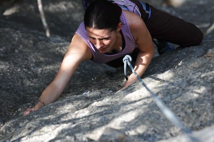 Beth Marek top rope climbing Hollywood (5.7), taken from the anchors of the route. It was Beth's third time outside, and another long day of rock climbing at Seismic Wall on Austin's Barton Creek Greenbelt, Monday, May 25, 2009.
Filename: SRM_20090525_10390631.JPG
Aperture: f/4.0
Shutter Speed: 1/640
Body: Canon EOS-1D Mark II
Lens: Canon EF 80-200mm f/2.8 L