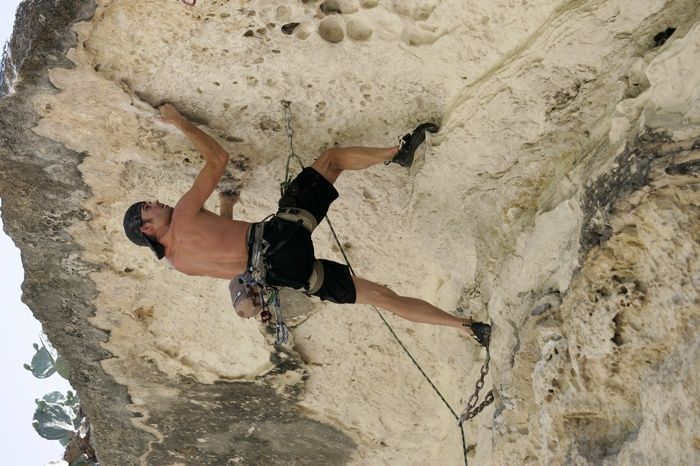 Tyler climbing Lonsome Dove (5.12), the roof above Diving for Rocks.  It was another long day of rock climbing at Seismic Wall on Austin's Barton Creek Greenbelt, Sunday, June 7, 2009.

Filename: SRM_20090607_13391180.jpg
Aperture: f/4.0
Shutter Speed: 1/500
Body: Canon EOS-1D Mark II
Lens: Canon EF 80-200mm f/2.8 L