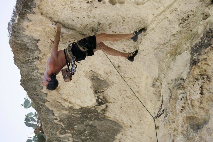 Tyler climbing Lonsome Dove (5.12), the roof above Diving for Rocks.  It was another long day of rock climbing at Seismic Wall on Austin's Barton Creek Greenbelt, Sunday, June 7, 2009.

Filename: SRM_20090607_13393985.jpg
Aperture: f/4.0
Shutter Speed: 1/500
Body: Canon EOS-1D Mark II
Lens: Canon EF 80-200mm f/2.8 L