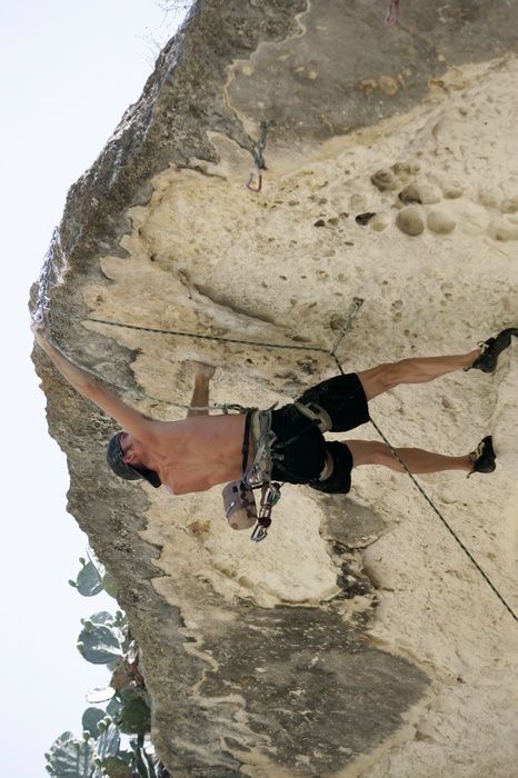 Tyler climbing Lonsome Dove (5.12), the roof above Diving for Rocks. It was another long day of rock climbing at Seismic Wall on Austin's Barton Creek Greenbelt, Sunday, June 7, 2009.
Filename: SRM_20090607_13443598.jpg
Aperture: f/4.0
Shutter Speed: 1/500
Body: Canon EOS-1D Mark II
Lens: Canon EF 80-200mm f/2.8 L