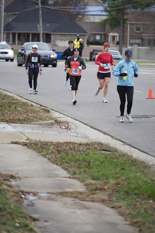 Beth Marek running the Rocket City Marathon on Saturday, December 12, 2009 in Huntsville.
Filename: SRM_20091212_12021519.JPG
Aperture: f/2.8
Shutter Speed: 1/800
Body: Canon EOS-1D Mark II
Lens: Canon EF 80-200mm f/2.8 L