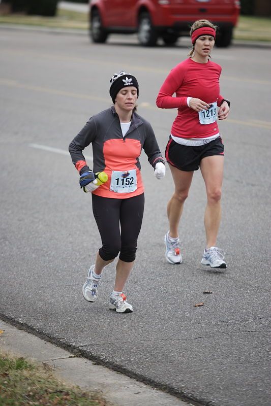 Beth Marek running the Rocket City Marathon on Saturday, December 12, 2009 in Huntsville.
Filename: SRM_20091212_12022430.JPG
Aperture: f/2.8
Shutter Speed: 1/800
Body: Canon EOS-1D Mark II
Lens: Canon EF 80-200mm f/2.8 L