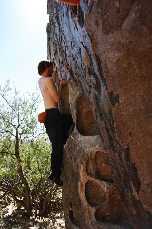 Andrew Dreher rock climbing in Hueco Tanks State Park and Historic Site during the Hueco Tanks Awesome Fest 2010 trip, Friday, May 21, 2010.
Filename: SRM_20100521_16292721.JPG
Aperture: f/4.0
Shutter Speed: 1/400
Body: Canon EOS-1D Mark II
Lens: Canon EF 16-35mm f/2.8 L