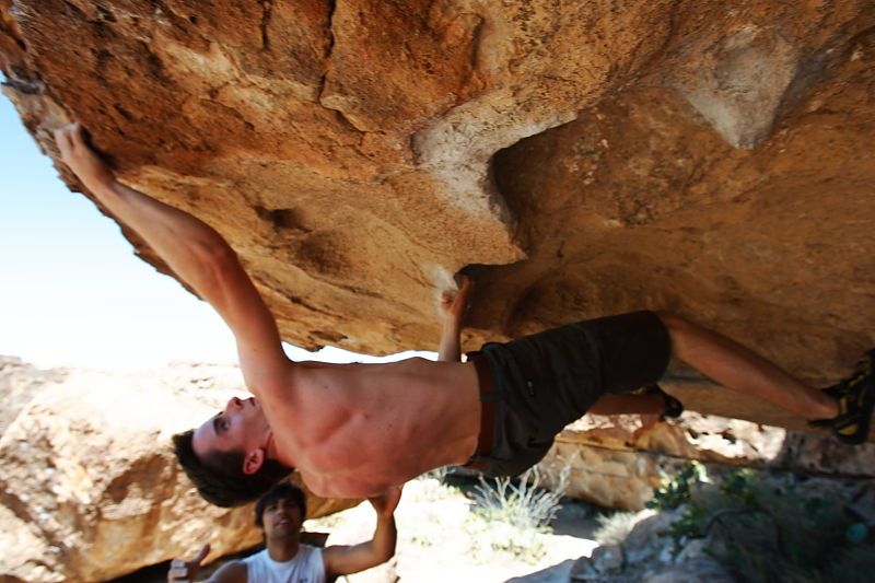 Raanan Robertson rock climbing in Hueco Tanks State Park and Historic Site during the Hueco Tanks Awesome Fest 2010 trip, Saturday, May 22, 2010.

Filename: SRM_20100522_12022059.JPG
Aperture: f/5.6
Shutter Speed: 1/160
Body: Canon EOS-1D Mark II
Lens: Canon EF 16-35mm f/2.8 L