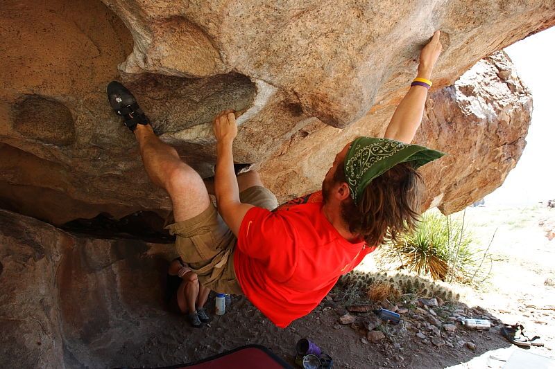 Steve Marek rock climbing on No One Gets Out of Here Alive (V2) in Hueco Tanks State Park and Historic Site during the Hueco Tanks Awesome Fest 2010 trip, Saturday, May 22, 2010.

Filename: SRM_20100522_15182001.JPG
Aperture: f/5.6
Shutter Speed: 1/320
Body: Canon EOS-1D Mark II
Lens: Canon EF 16-35mm f/2.8 L