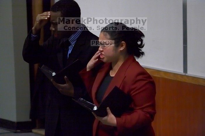 Donald Collier and Sally Rivero rehearse their Duo Interpretation of "Architecture of Loss," by Julia Cho.  The University of Texas' Speech Team will compete in the American Forensic Association�s National Individual Events Tournament (AFA NIET) in Gainesv

Filename: SRM_20060325_140722_0.jpg
Aperture: f/3.5
Shutter Speed: 1/160
Body: Canon EOS 20D
Lens: Canon EF 80-200mm f/2.8 L